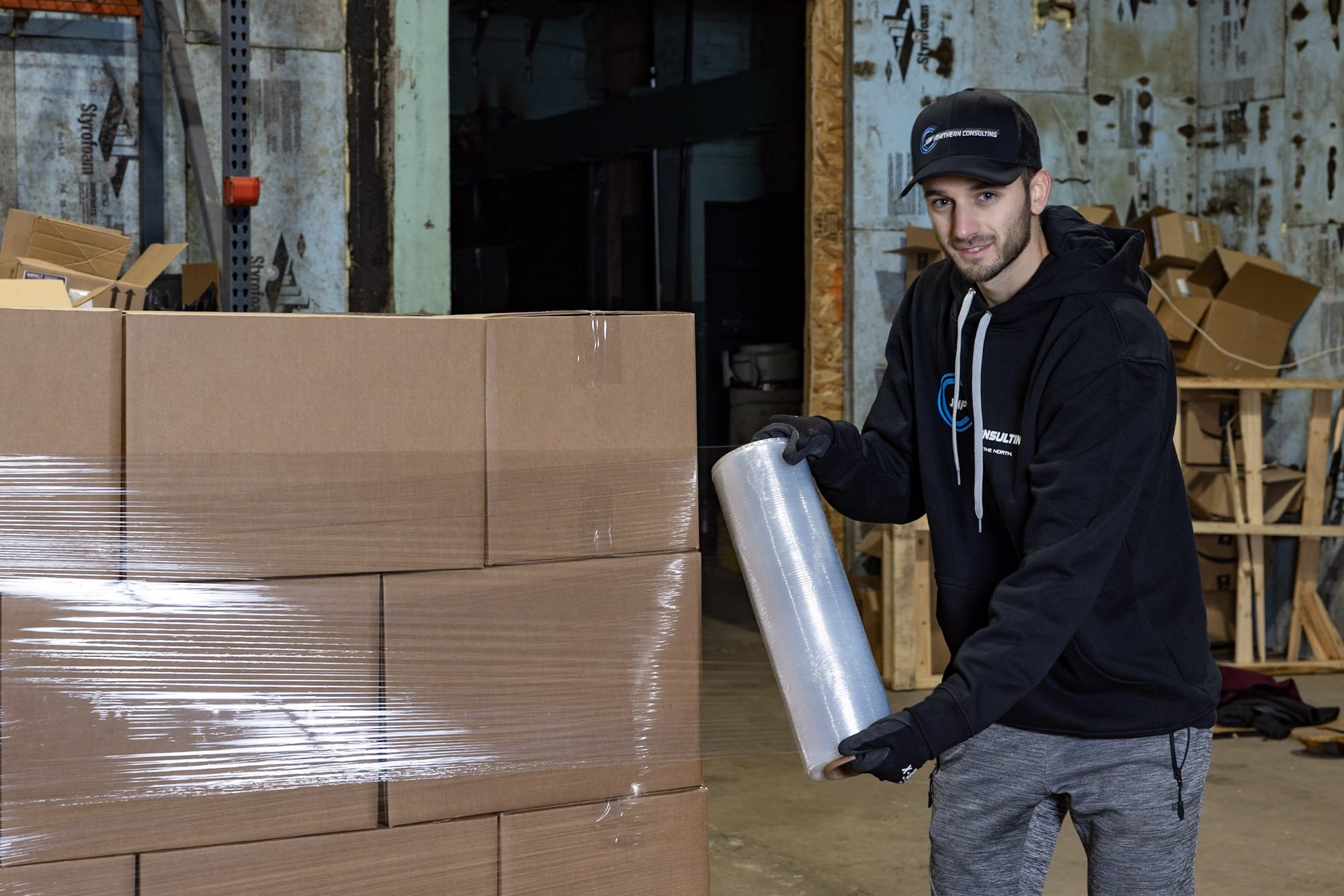 Shrink wrapping a pallet before it goes on the truck